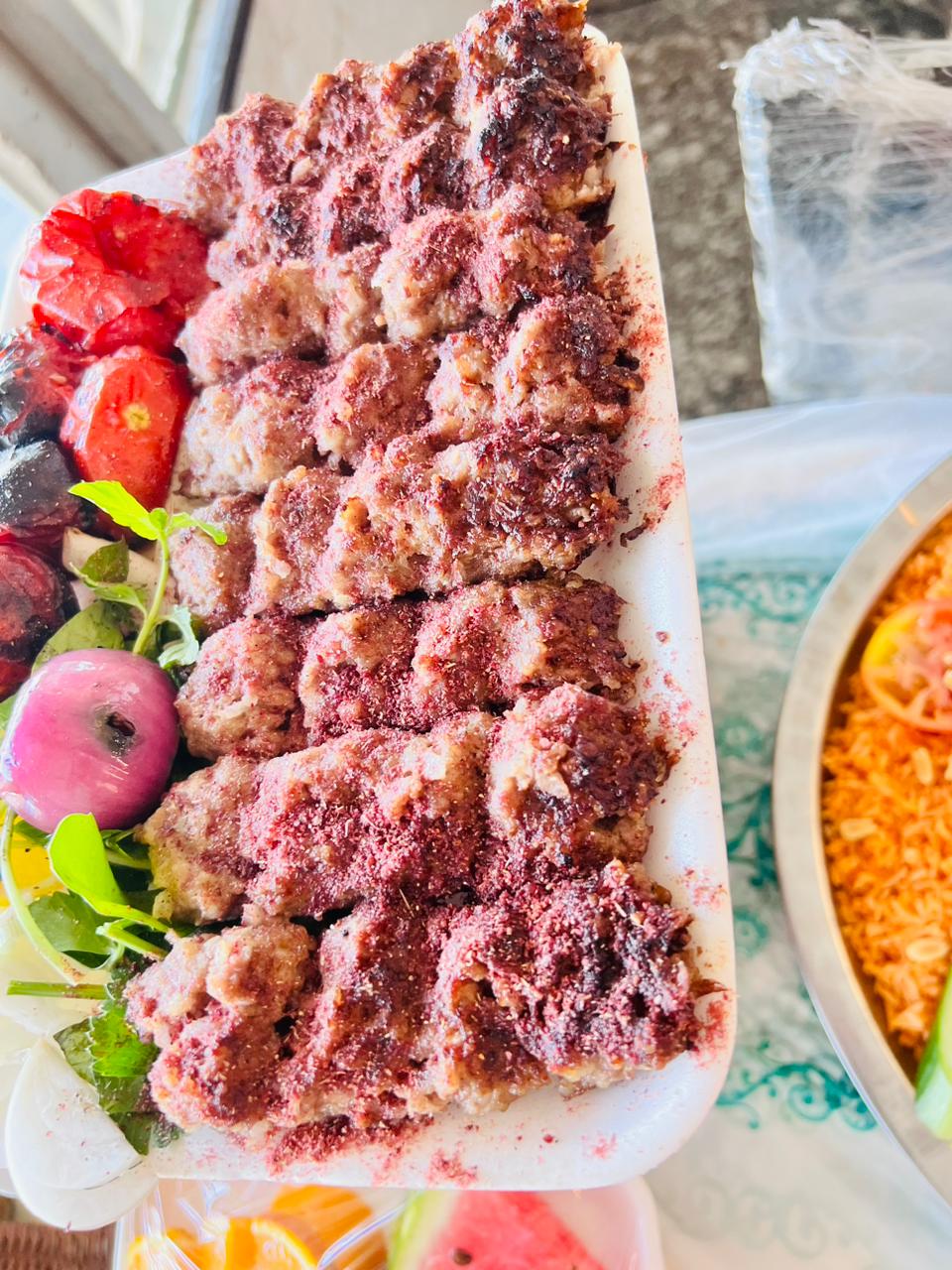 نص كيلو كباب غنم عراقي + خبز + سوب + مقبلات + طماطه + بصل شوي 