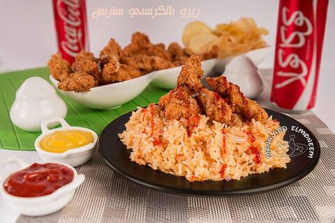 بافالو ريزو ( اجنحة دجاج مقرمش مع الرز الخاص )